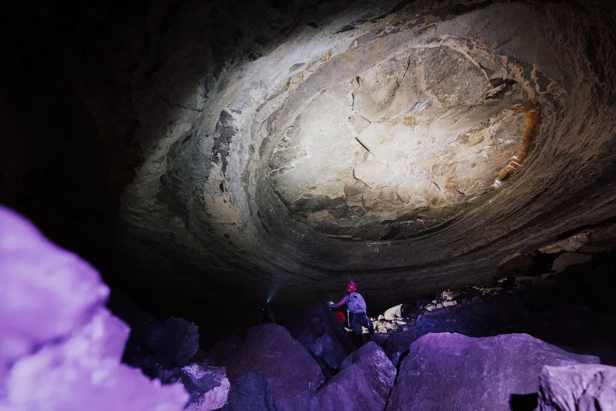 Explore the large underground world with a team on an exciting cave expedition.